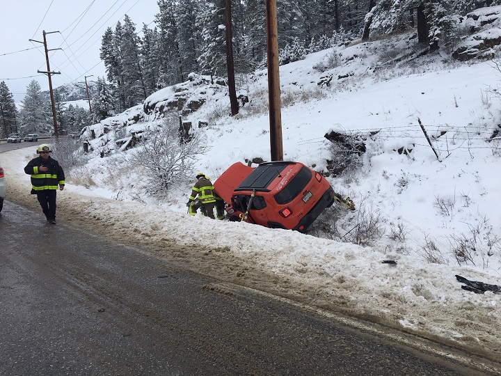 Icy conditions led to slow commutes and accidents along some roads in the Central Okanagan on Friday morning. Here, a Jeep is in the ditch following an accident on Highway 33.