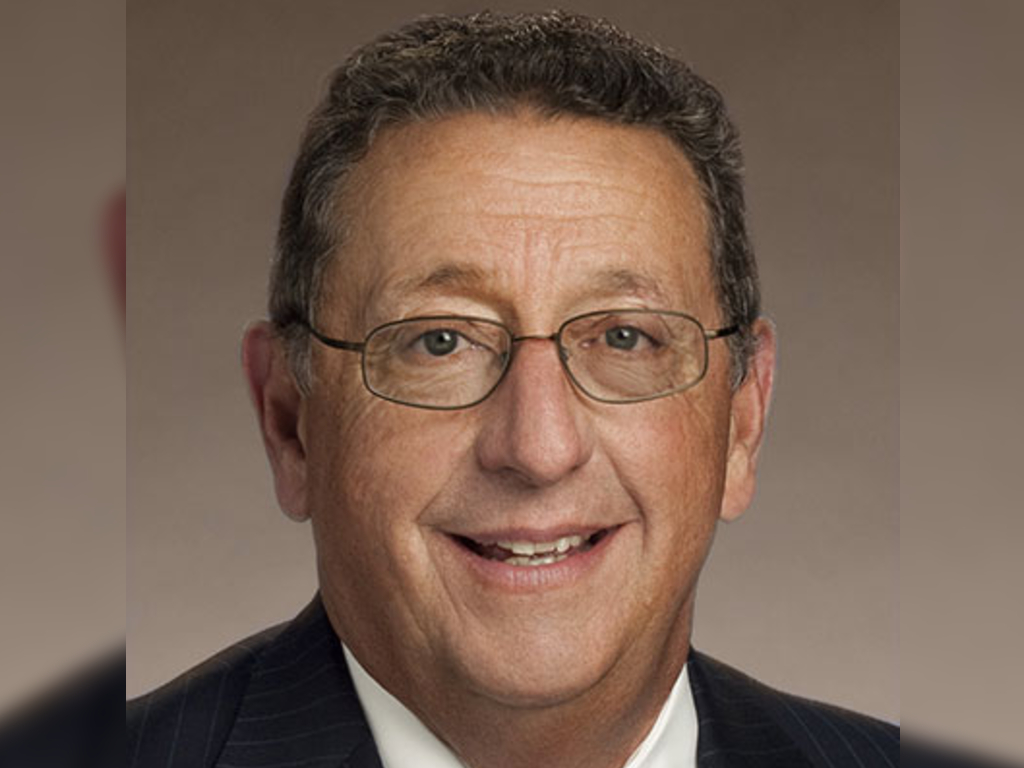 Rep. Kent Calfee pulled out a Hershey's chocolate syrup bottle during a legislative meeting.