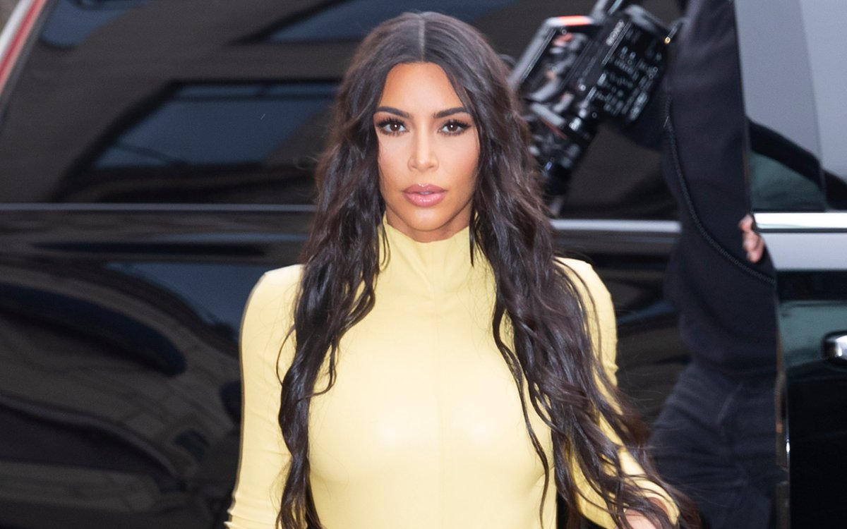 Kim Kardashian wears yellow on February 5, 2020 in New York City. 