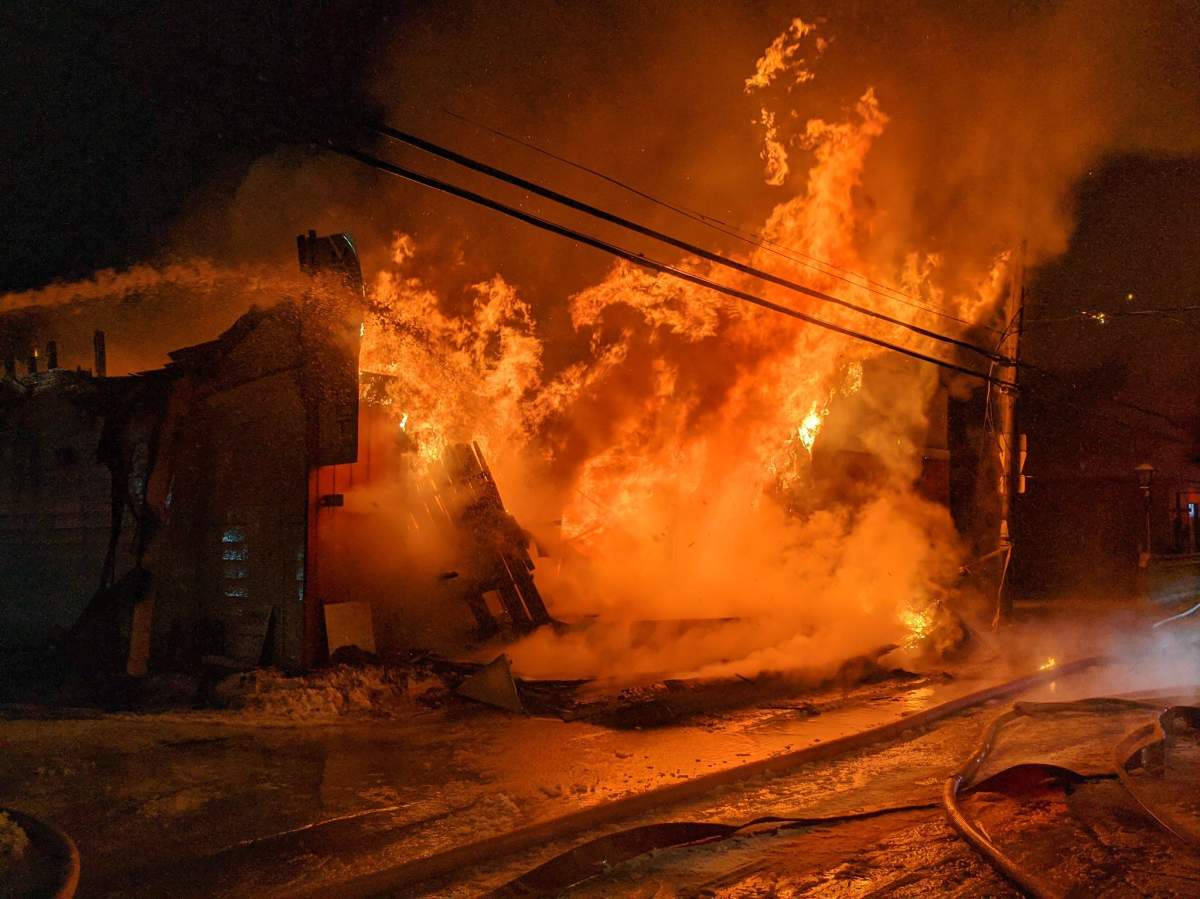Ottawa firefighters spent hours tackling a third-alarm fire that collapsed the front of a restaurant in the city’s rural south end early Monday morning.