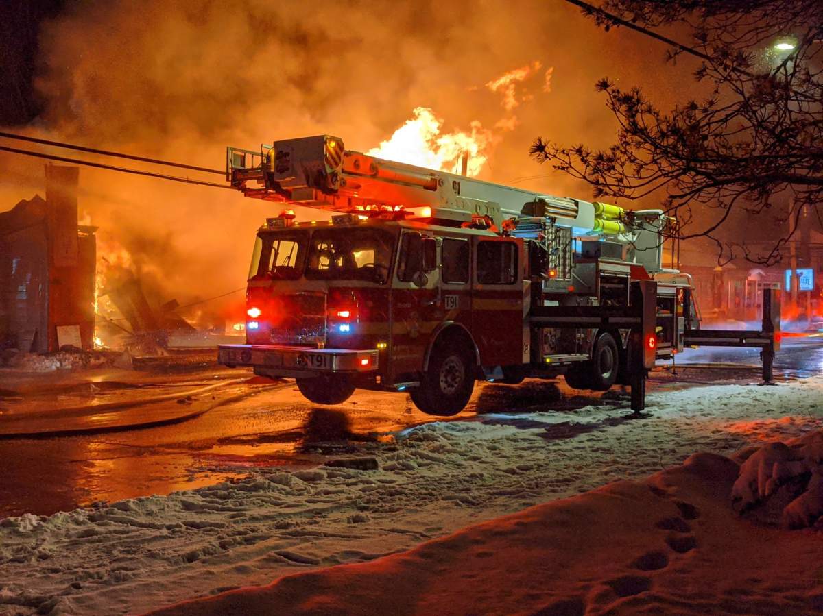 Ottawa firefighters spent hours tackling a three-alarm fire that collapsed the front of a restaurant in the city’s rural south end early Monday morning.