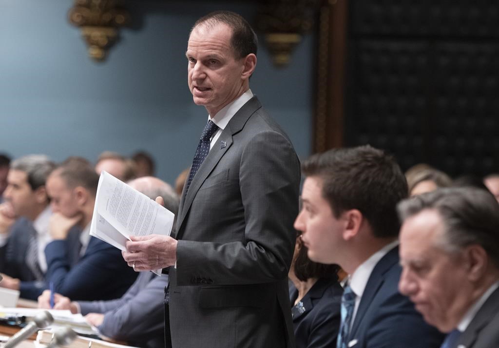 In this file photo, Quebec Finance Minister Eric Girard tables a legislation on December 5, 2019 at the legislature in Quebec City. Girard will table the 2020 budget on March 10.