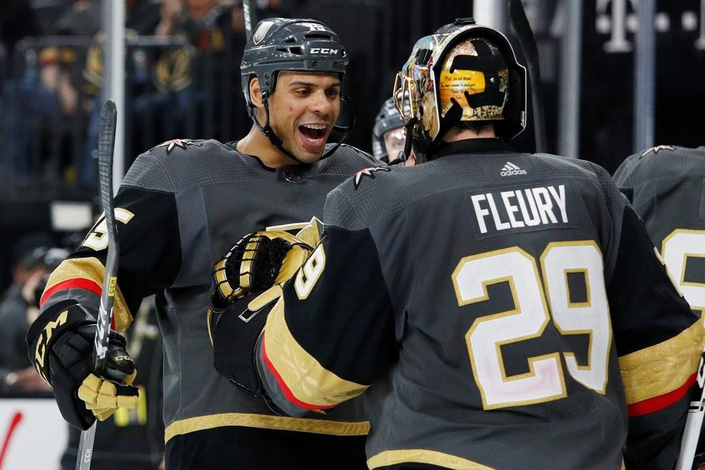 Vegas Golden Knights' Ryan Reaves, left, celebrates with goaltender Marc-Andre Fleury after defeating the Edmonton Oilers in an NHL hockey game Wednesday, Feb. 26, 2020, in Las Vegas.