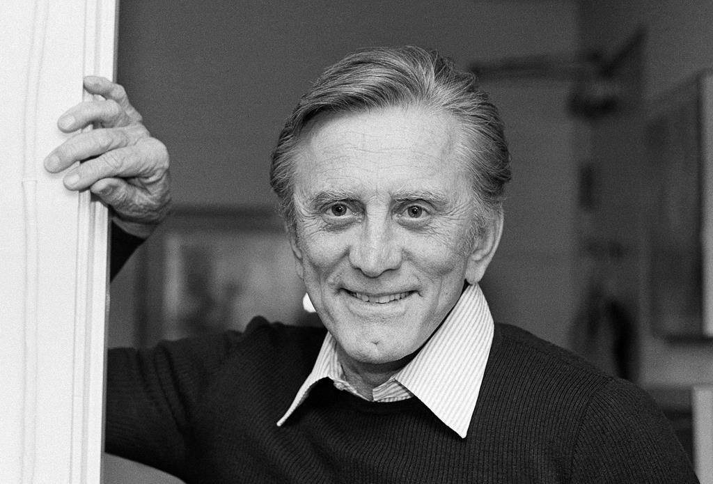 FILE – This Nov. 16, 1982 file photo shows actor Kirk Douglas at his home in Beverly Hills, Calif. Douglas died Wednesday, Feb. 5, 2020 at age 103. (AP Photo/Wally Fong, File)