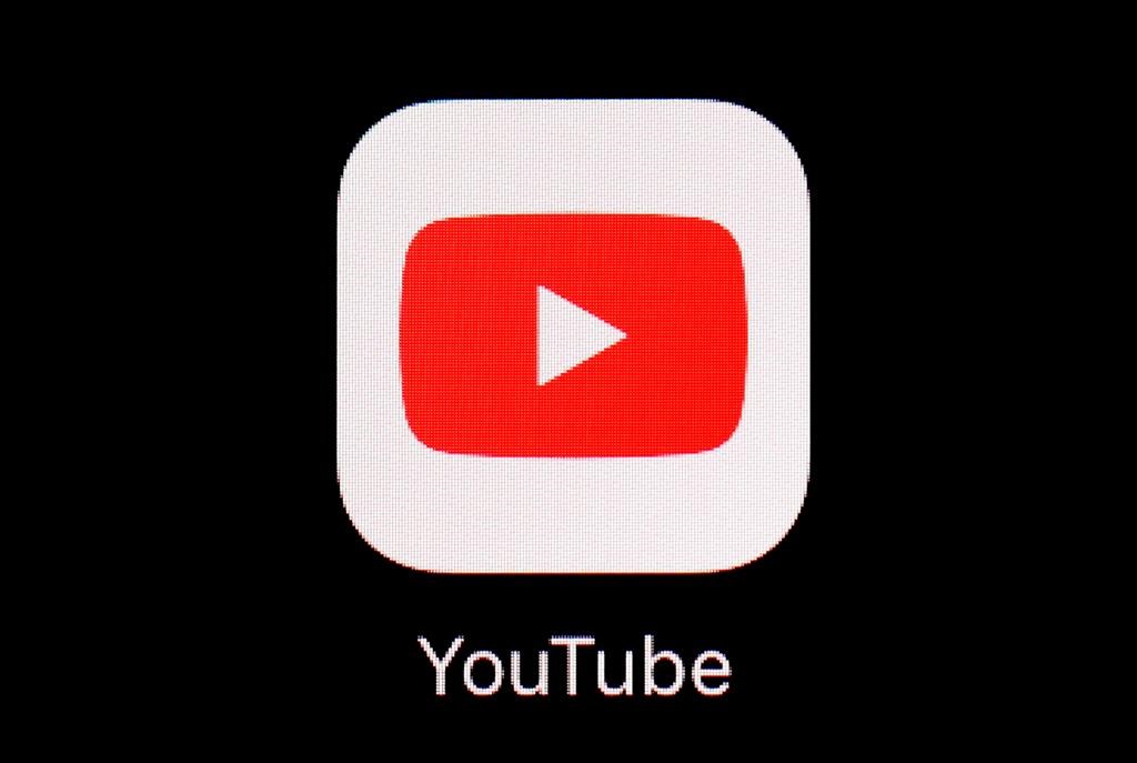 FILE - This March 20, 2018, file photo shows the YouTube app on an iPad. YouTube is making clear there will be no “birtherism” on its platform during this year's U.S. presidential election. Also banned: Election-related “deepfake” videos and anything that aims to mislead viewers about voting procedures and how to participate in the 2020 census. The Google-owned video service clarified its rules ahead of the Iowa caucuses Monday, Feb. 2, 2020. (AP Photo/Patrick Semansky, File).