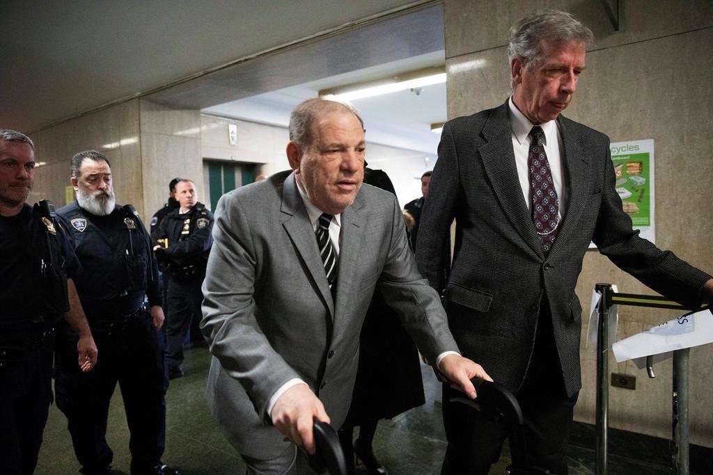 Harvey Weinstein arrives at court for his trial on charges of rape and sexual assault, Friday, Jan. 31, 2020 in New York.