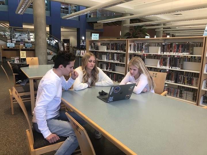 Okanagan students Ty Frydanlund, left, Athina Merckx and Megan Corrigan are raising funds for poor families in Guatemala.