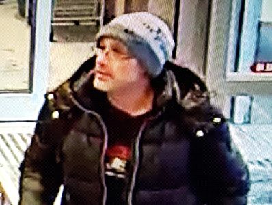 Ottawa police are asking the public to help them identify the man in this photo. Investigators claim the man pulled a knife on store employees who tried to stop him from stealing a bottle of alcohol in downtown Ottawa on Feb. 9, 2020.