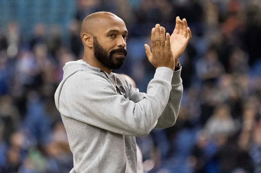 Montreal Impact head coach Thierry Henry celebrates after their round of sixteen victory following CONCACAF Champions League action against Deportivo Saprissa, in Montreal, Wednesday, Feb. 26, 2020.