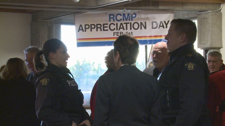 RCMP officers and Vernon residents gather at the Vernon Museum for an open house.