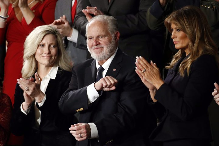 Rush Limbaugh reacts as first lady Melania Trump, and his wife Kathryn, applaud, as President Donald Trump delivers his State of the Union address to a joint session of Congress on Capitol Hill in Washington, Tuesday, Feb. 4, 2020.
