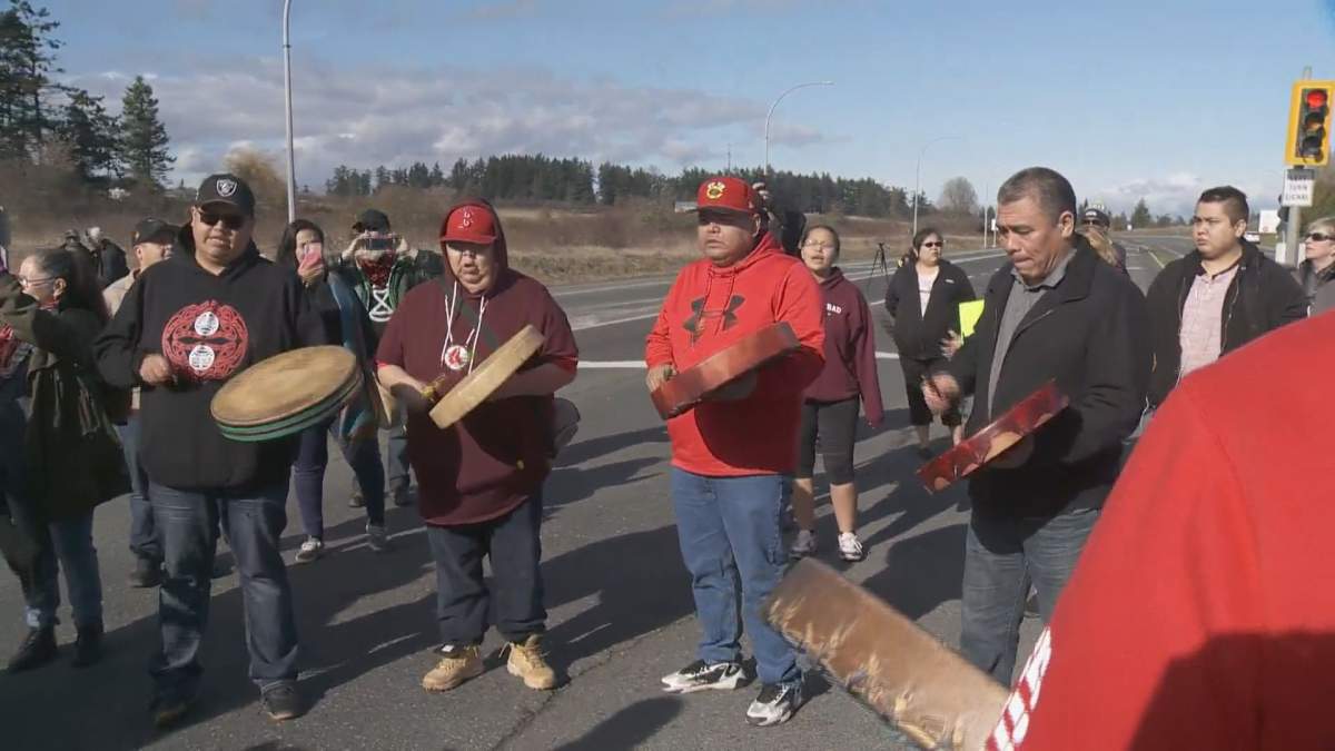 Indigenous demonstrators take to the centre of the Patricia Bay Highway in solidarity with Wet'suwet'en hereditary chiefs on Wednesday, Feb. 26, 2020. 