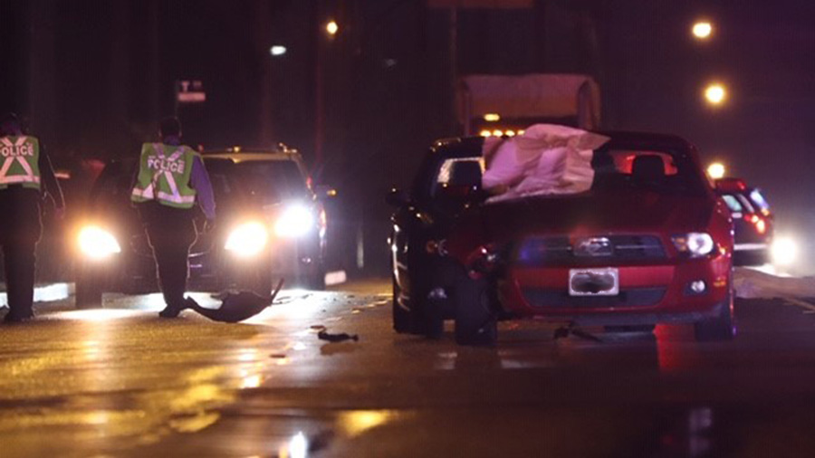 Surrey RCMP at the scene of a fatal crash involving a pedestrian on Highway 10 in the Cloverdale area of Surrey on Feb. 14, 2020.