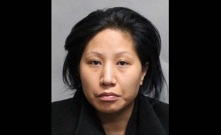 Police say Nina Laxamana is wanted on several charges including assaulting a police officer with a weapon.