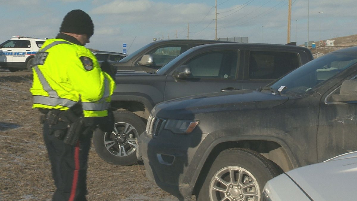 Police are issuing parking tickets to vehicles involved in blocking the gates in and out of Regina's Co-op refinery.
