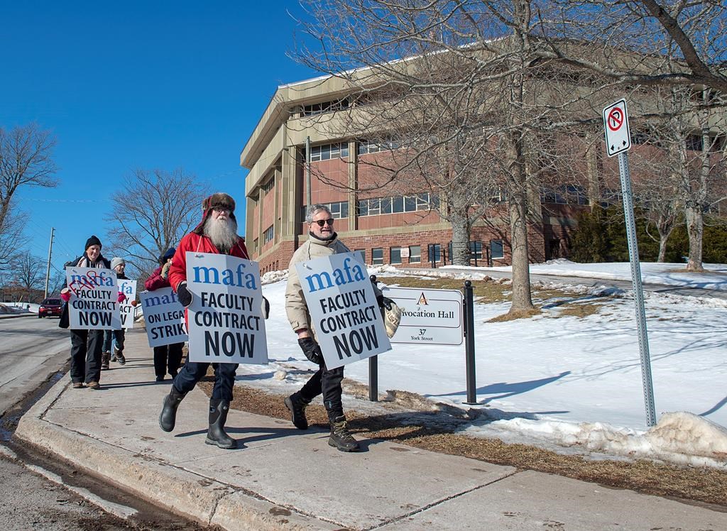 Strikers walk the picket line at Mount Allison University in Sackville, N.B. on Monday, February 3, 2020.