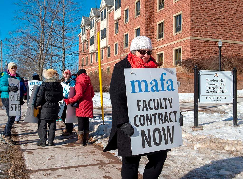 Strikers walk the picket line at Mount Allison University in Sackville, N.B. on Monday, February 3, 2020.