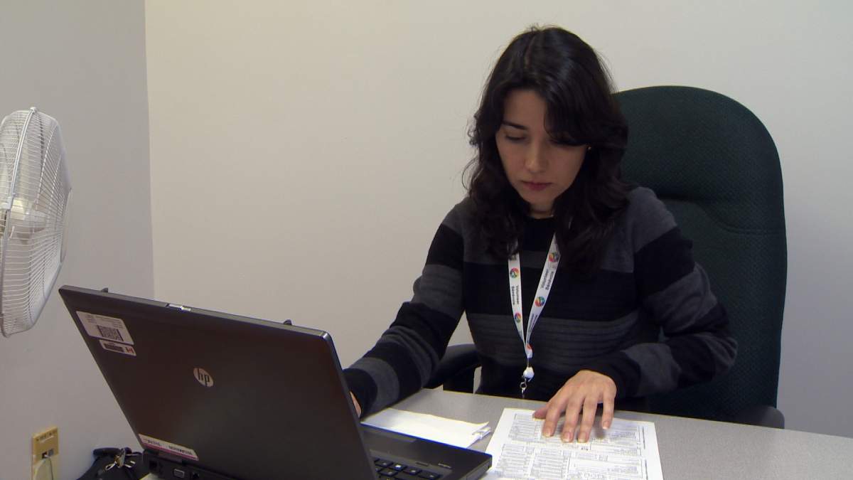 Najmeh Abtahi puts her finance experience to work, volunteering for the tax clinic.