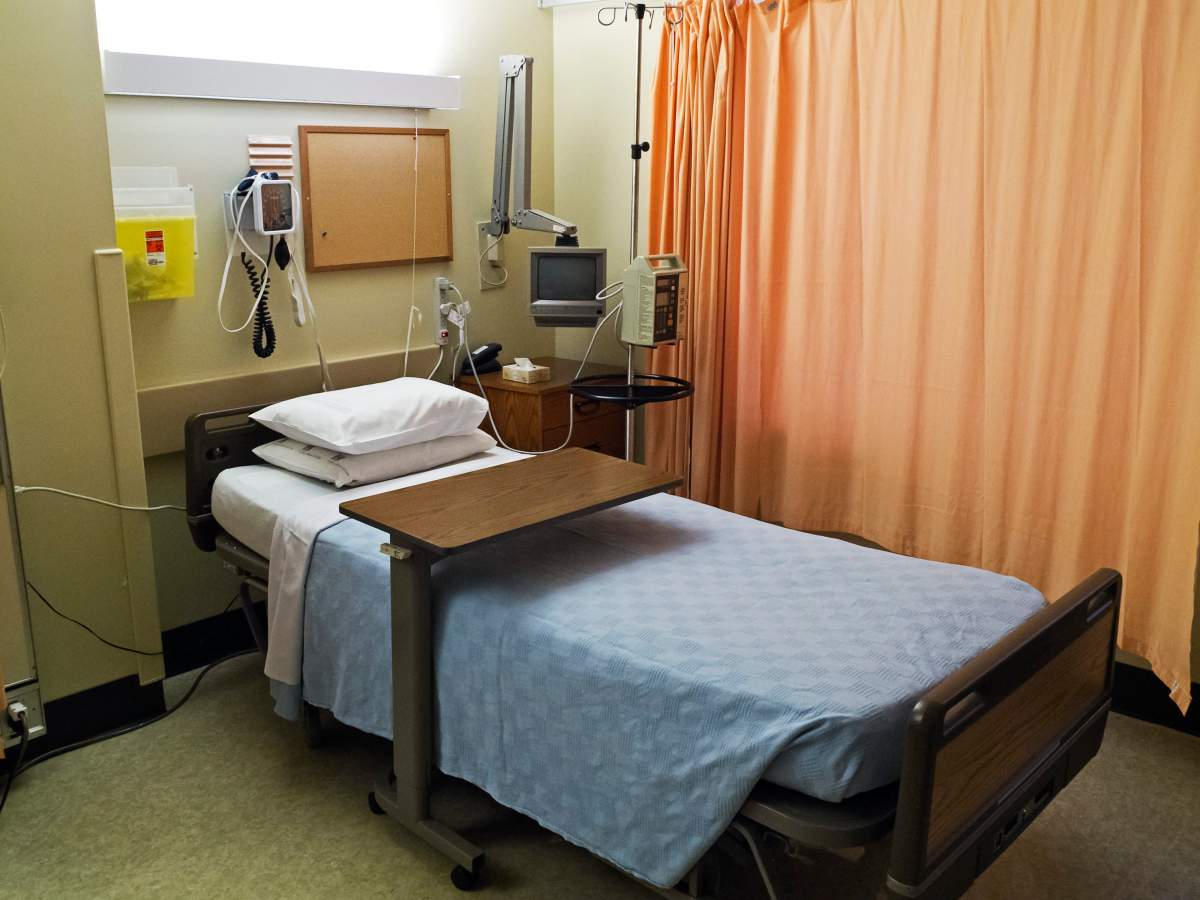 An empty hospital bed.