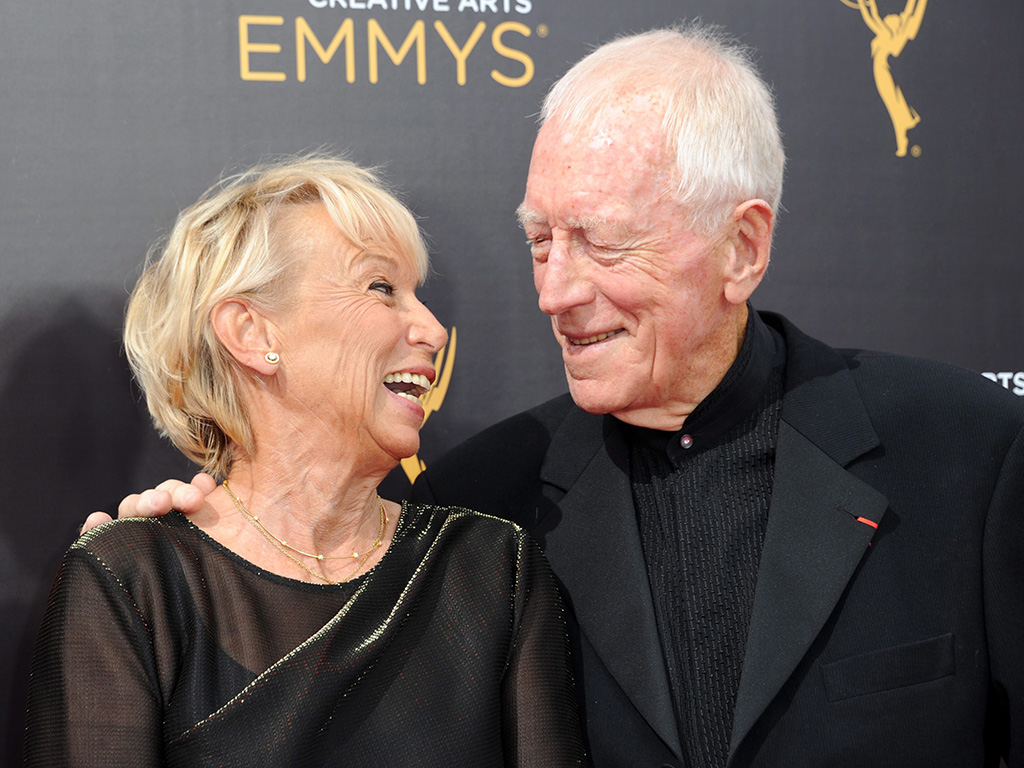 Catherine Brelet, left, and Max von Sydow arrive at Night 1 of the Creative Arts Emmy Awards at the Microsoft Theater on Saturday, Sept. 10, 2016, in Los Angeles, Calif.