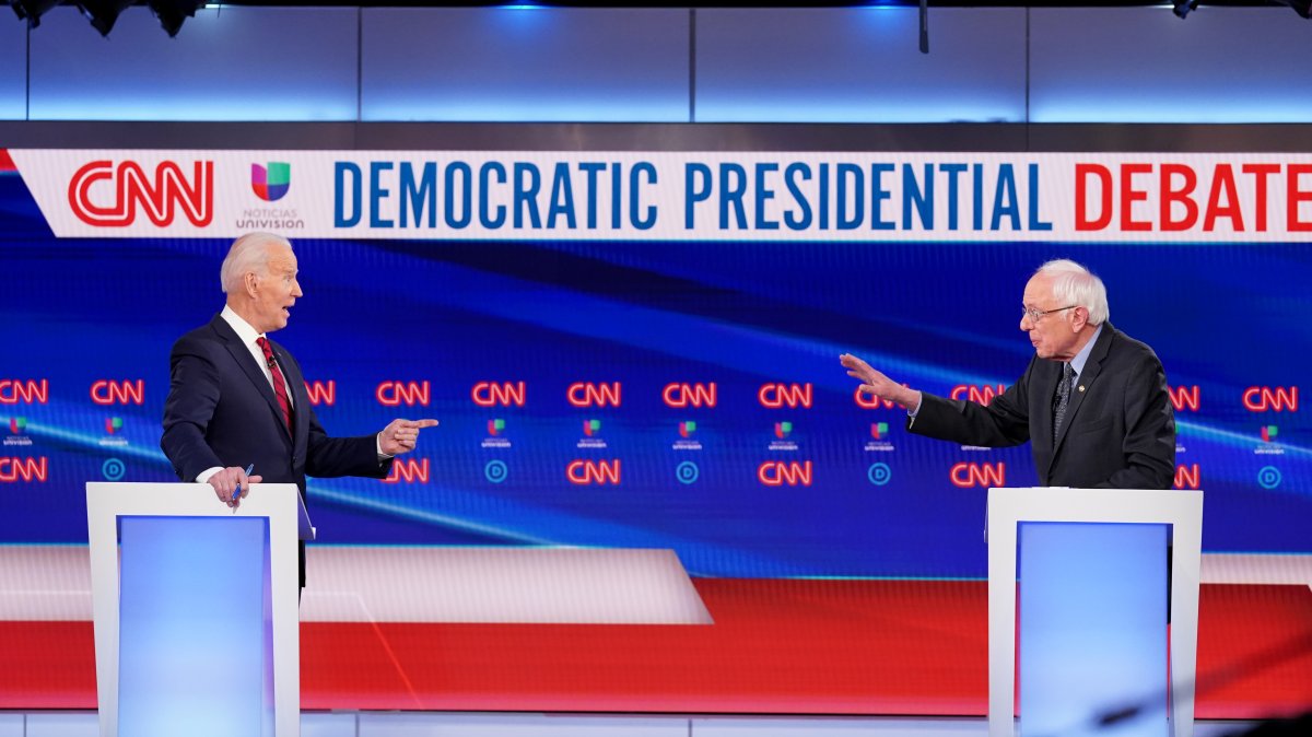 Democratic U.S. presidential candidates former Vice President Joe Biden and Senator Bernie Sanders debate during the 11th Democratic candidates debate of the 2020 U.S. presidential campaign, held in CNN's Washington studios without an audience because of the global coronavirus pandemic, in Washington, U.S., March 15, 2020. 