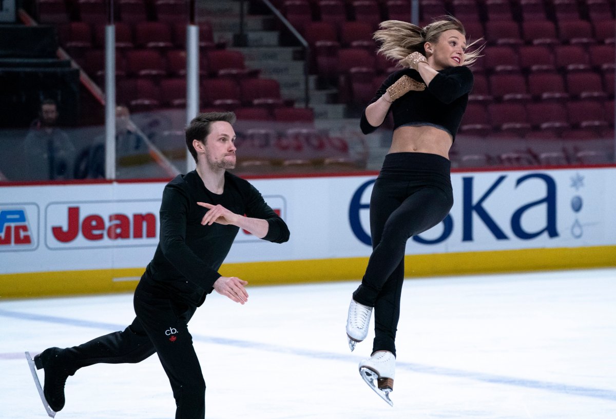 Canadian pairs Kirsten Moore-Towers is thrown by her partner Michael Marinaro during a practice in Montreal, on Monday, February 24, 2020. The World Figure Skating Championships will be held in Montreal in March. 