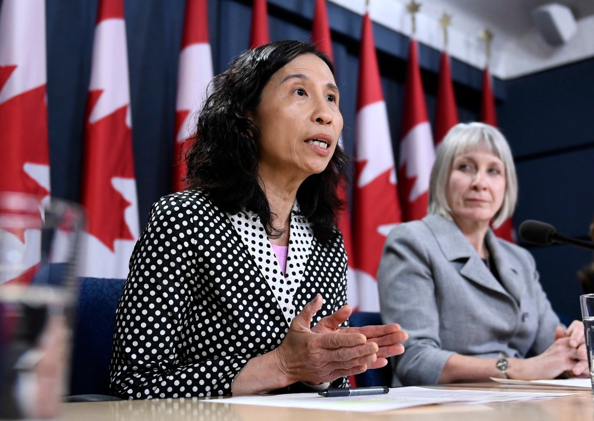 Canada's chief public health officer, Dr. Theresa Tam, speaks as Minister of Health Patty Hajdu listens during an update on COVID-19 at the National Press Theatre in Ottawa on Wednesday, March 4, 2020.