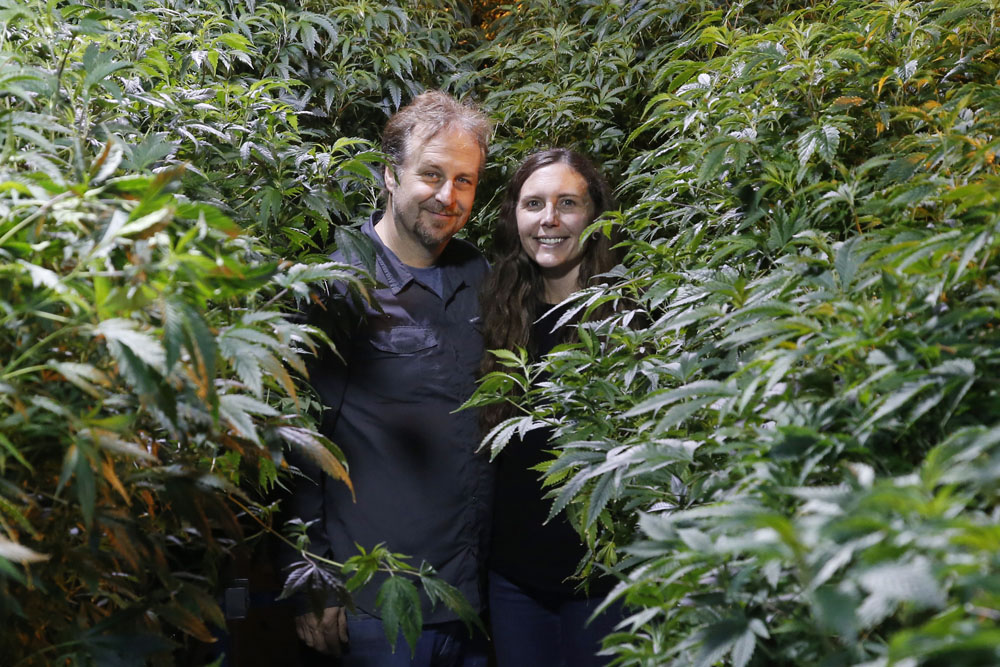 Chip and Jessica Baker pose for a photo at their marijuana nursery at Baker's Medical, Feb. 26, 2020, in Oklahoma City. 