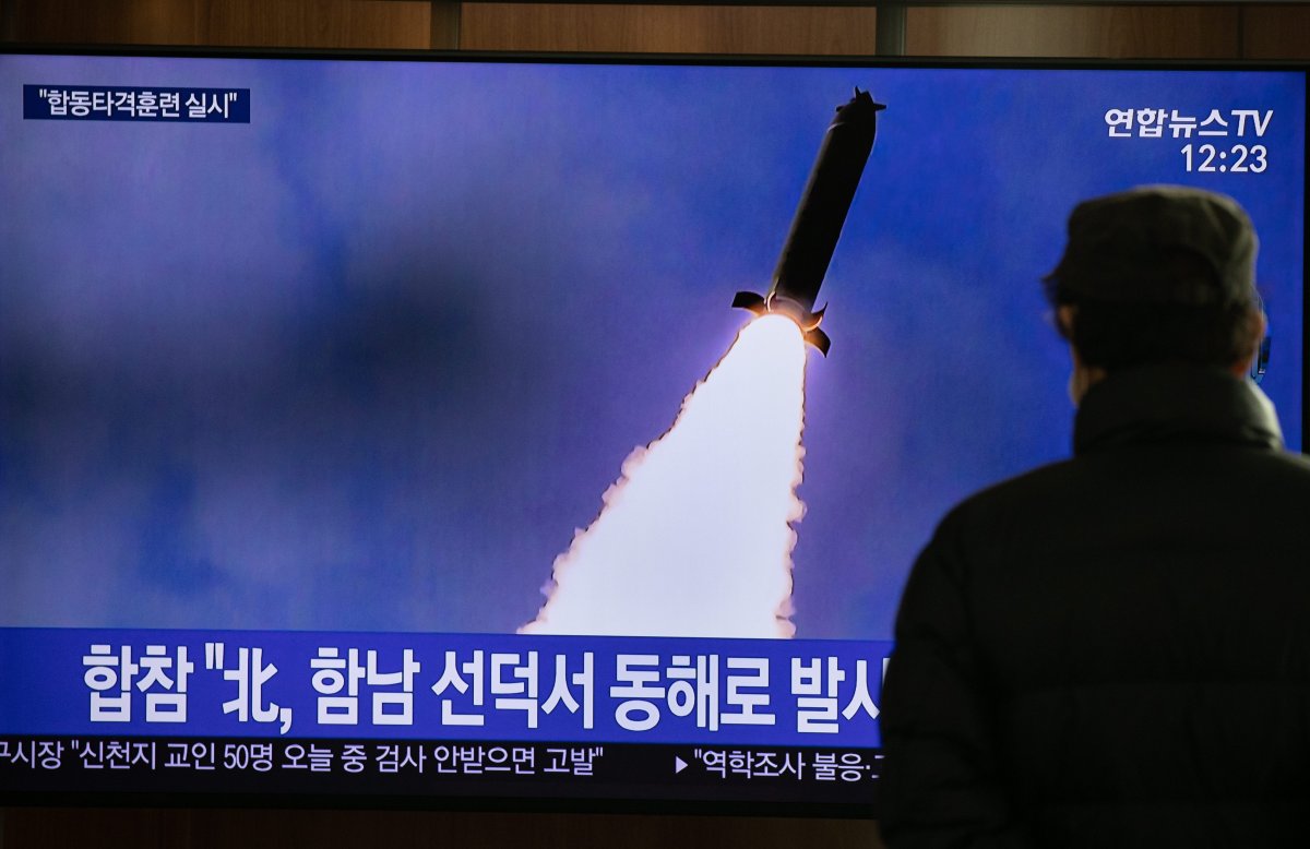 FILE - A South Korean man watches a breaking news report for North Korea's recent missile launch, at Seoul Station in Seoul, South Korea, 09 March 2020.