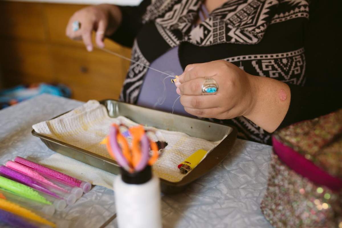 Janet Antone working on her jewellery