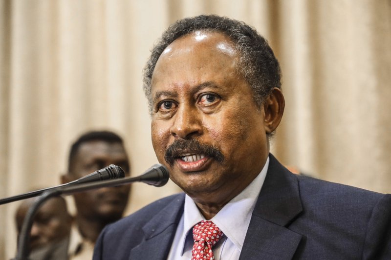 FILE - In this Aug. 21, 2019, file photo, Sudan's new Prime Minister Abdalla Hamdok speaks during a press conference in Khartoum, Sudan. Sudan's state media Monday, March 9, 2020, says Hamdok has survived an assassination attempt after a blast in the capital Khartoum. 