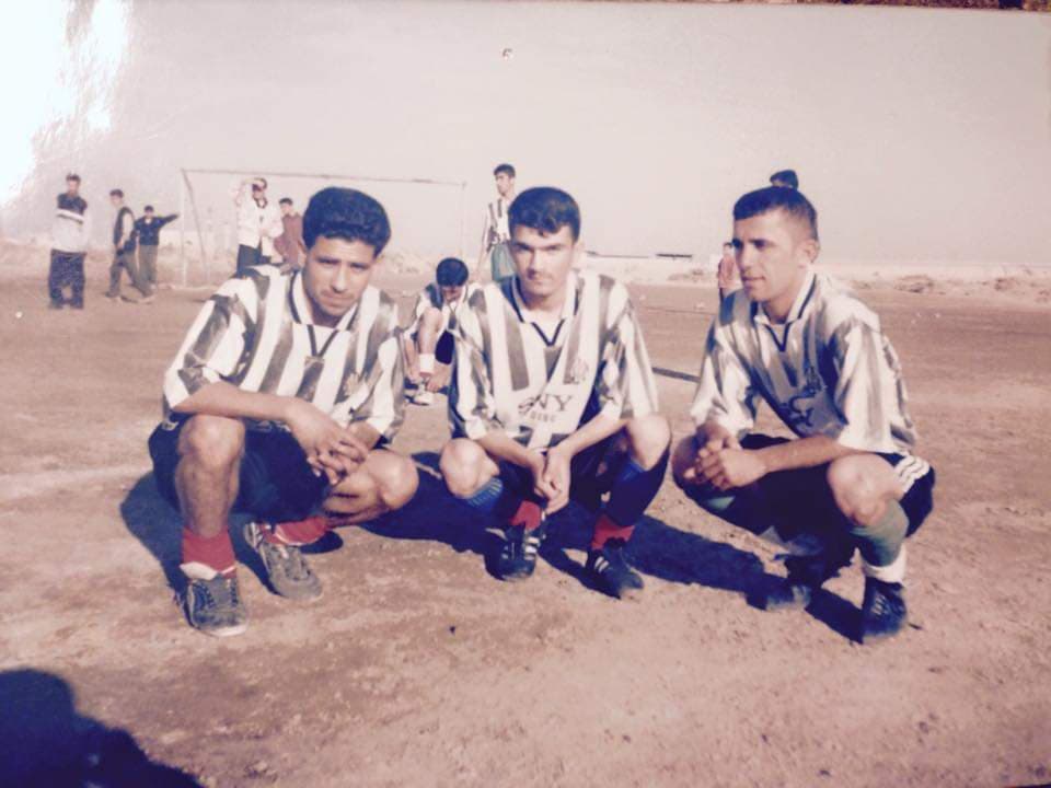 Rahimi, centre, was an avid soccer player before coming to Canada.