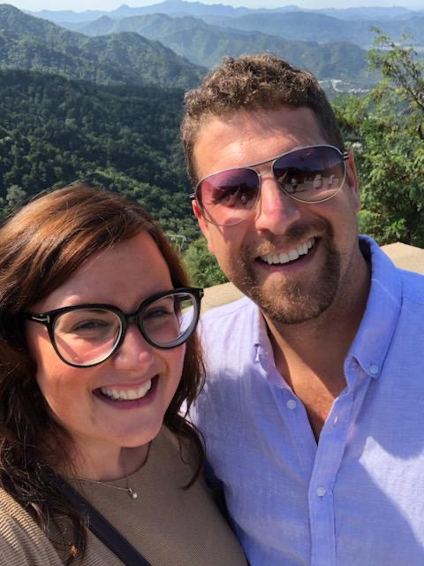 Amy and Kevin Passafiume pose for a picture at The Great Wall of China before the coronavirus outbreak.