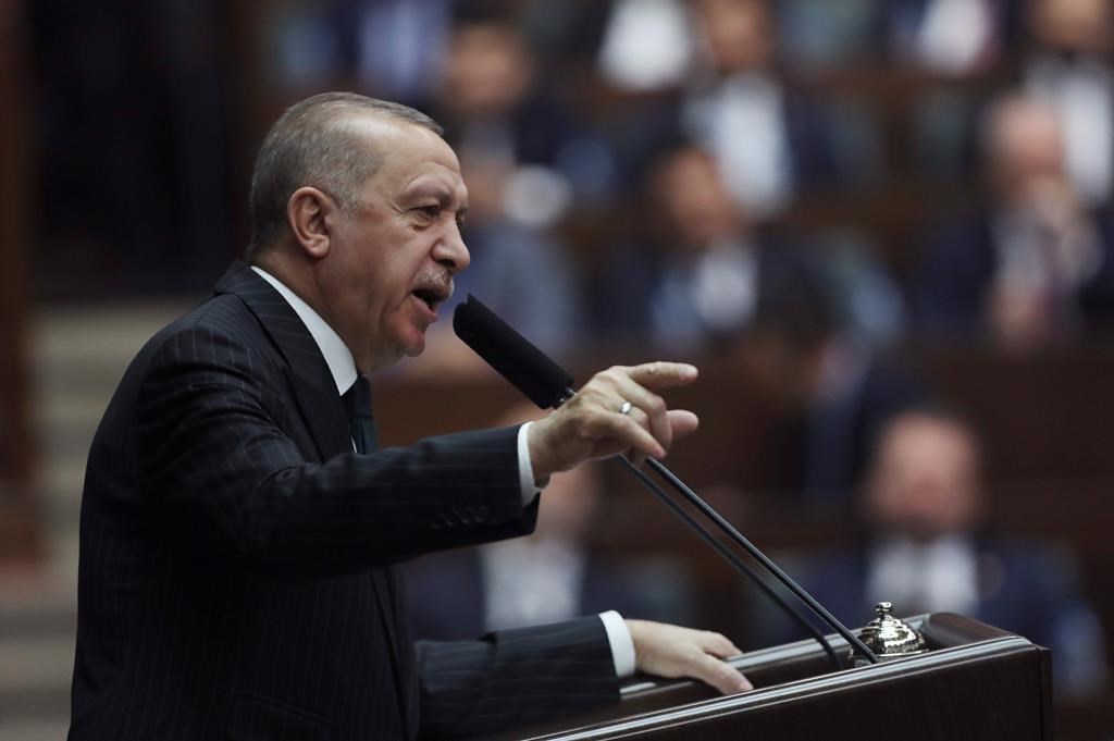 Turkish President Recep Tayyip Erdogan4 addresses the members of his ruling party in Parliament, in Ankara, Turkey, Wednesday, March 4, 2020.