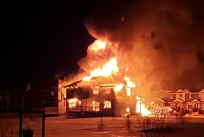 A home being built in Beaumont’s Dansereau neighbourhood going up in flames Monday, March 2, 2020.