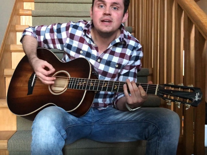 The song by Ben Klick of West Kelowna, seen here performing the song on a set of stairs, is about trying to self-isolate to help prevent the spread of COVID-19.