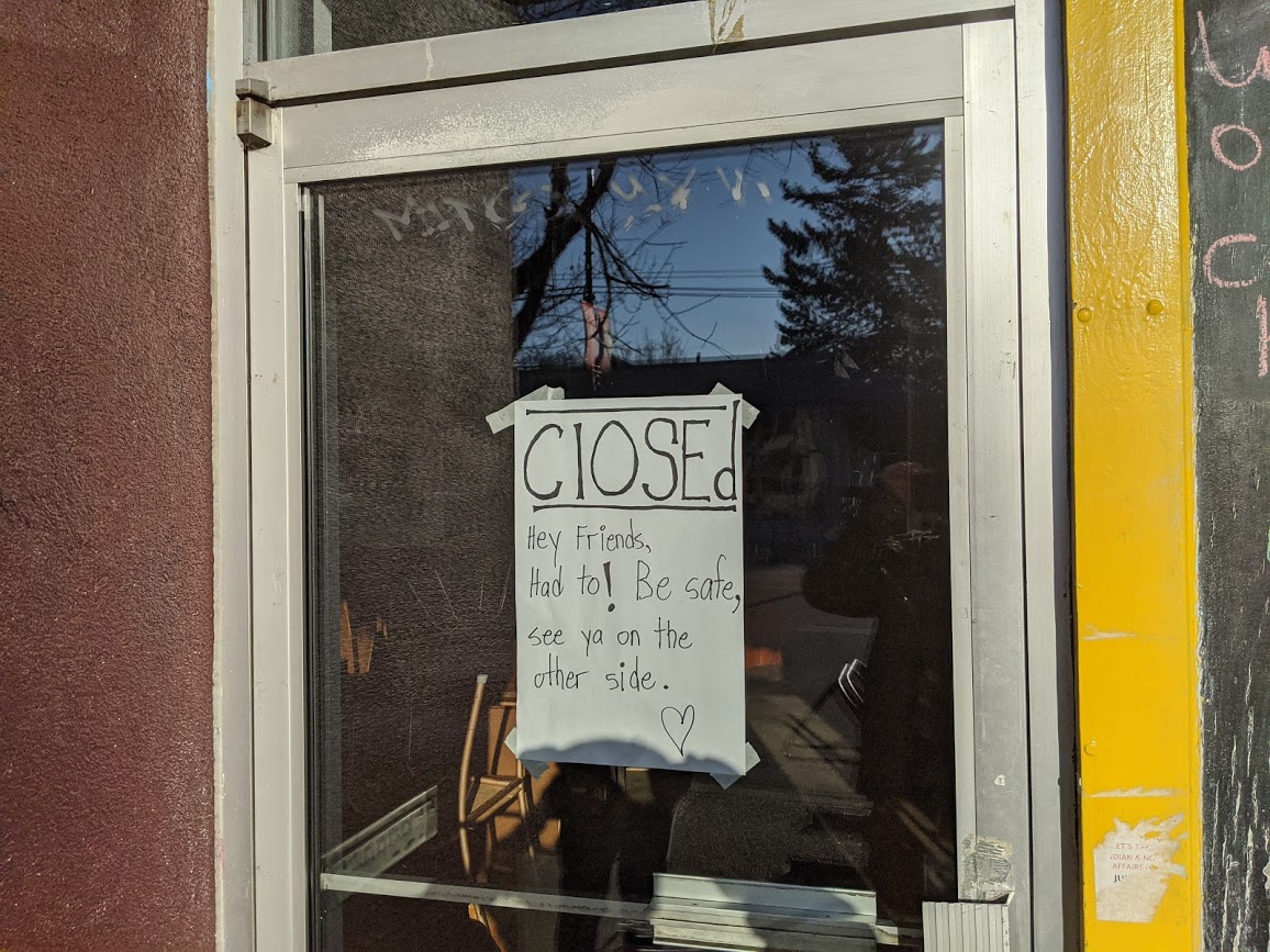 A sign on the door of Cafe Deux Soleil on Vancouver's Commercial Drive. Restaurants in the province have been ordered to stop dine-in service amid the coronavirus pandemic, putting thousands of people out of work. 