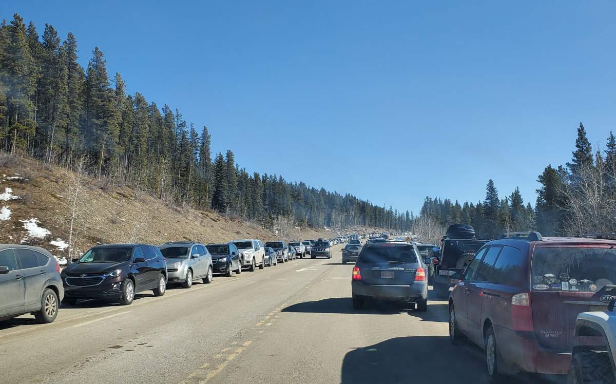 Traffic near Elbow Falls, Alta., on Saturday, March 21, 2020.
