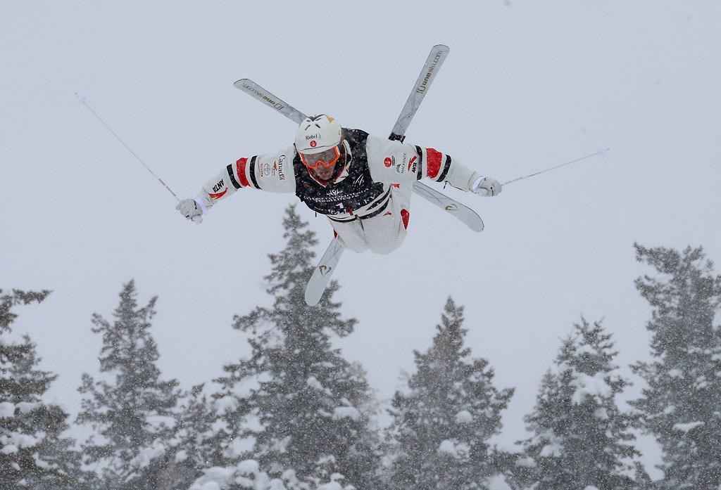 Mikael Kingsbury, of Canada, trains during the men's dual moguls skiing world championship in Park City, Utah, Saturday, Feb. 9, 2019.