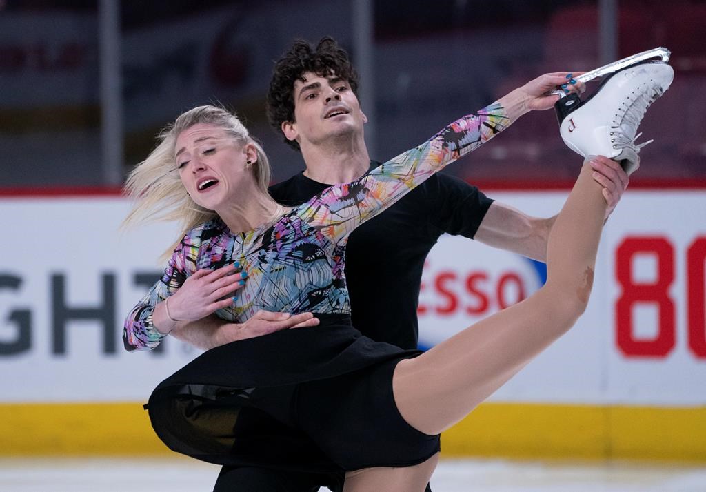 Canadian ice dancers Piper Gilles and Paul Poirier perform their routine during a practice in Montreal, on Monday, February 24, 2020. The International Skating Union sent out strict requirements for attending next week's world figure skating championships in Montreal amid the threat of the novel coronavirus.