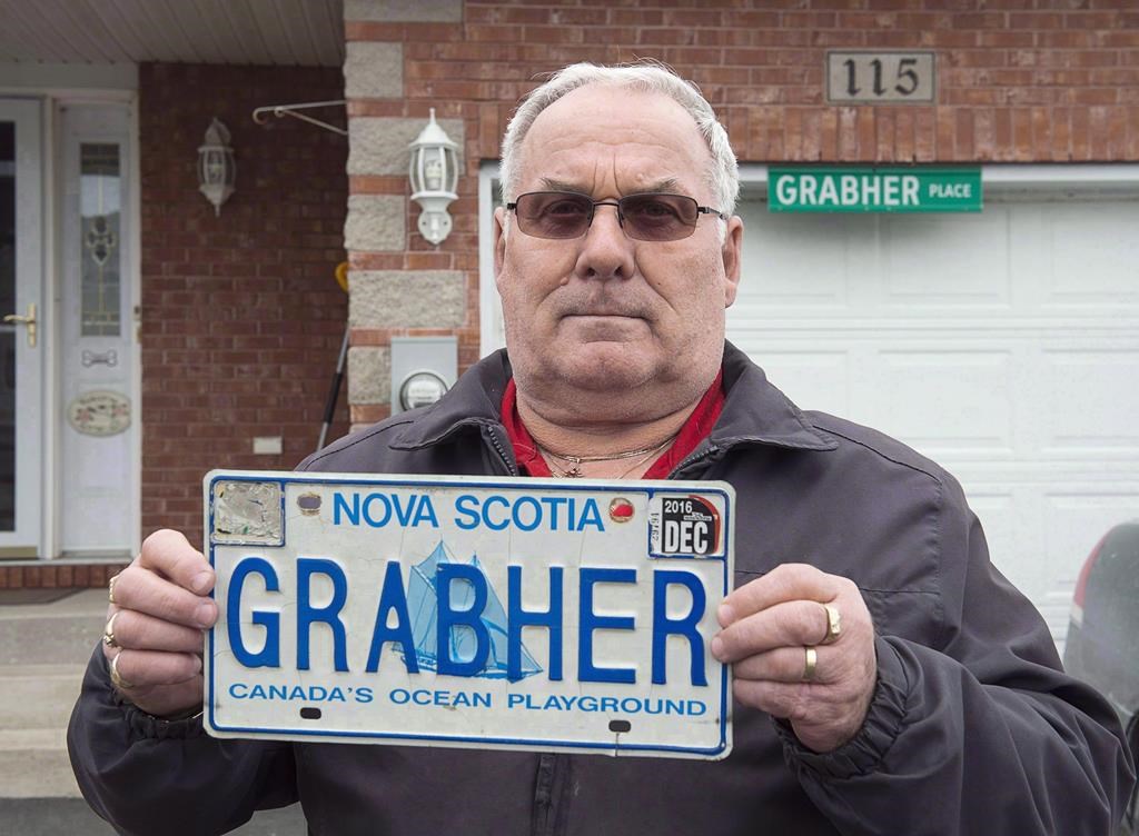 Lorne Grabher displays his personalized licence plate in Dartmouth, N.S. on Friday, March 24, 2017.