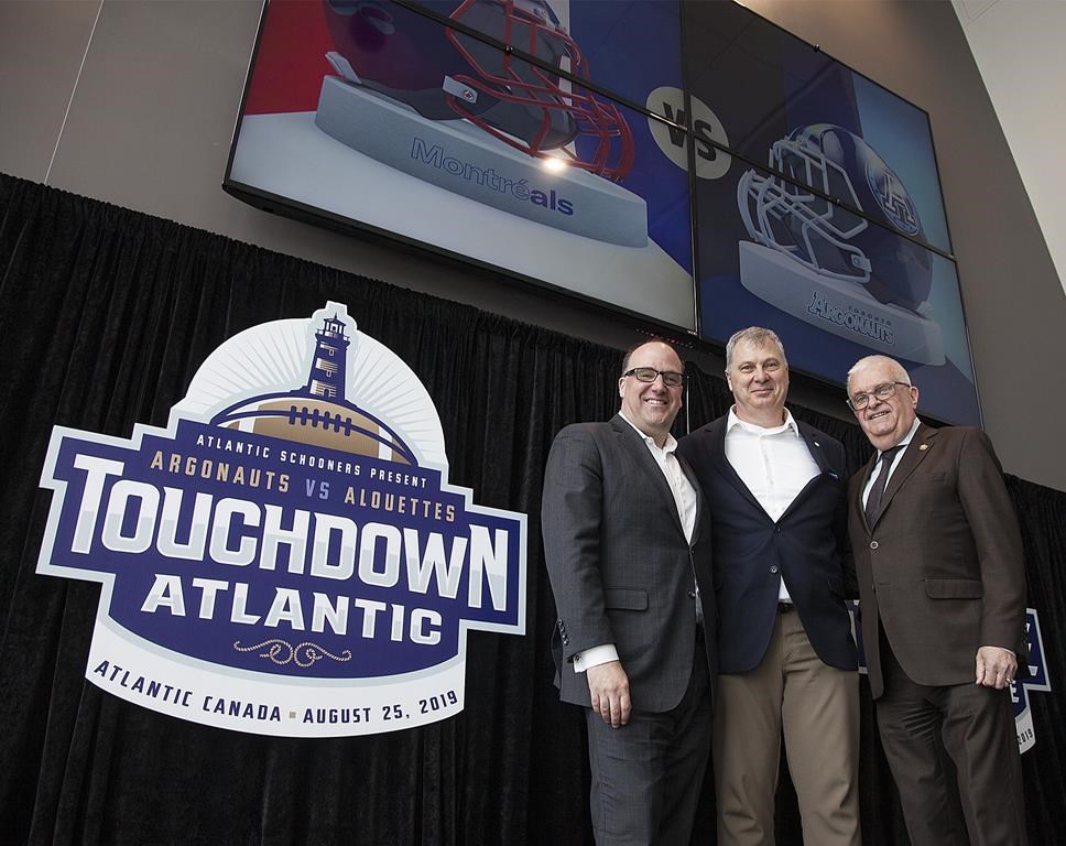 Anthony LeBlanc, Founding Partner, Schooners Sports and Entertainment, Randy Ambrosie, Commissioner, Canadian football League, and Greg Turner, Councillor-at-Large and Deputy Mayor, City of Moncton pose for a photo at a press conference in Moncton, N.B., on March 29, 2019. THE CANADIAN PRESS/Ron Ward
