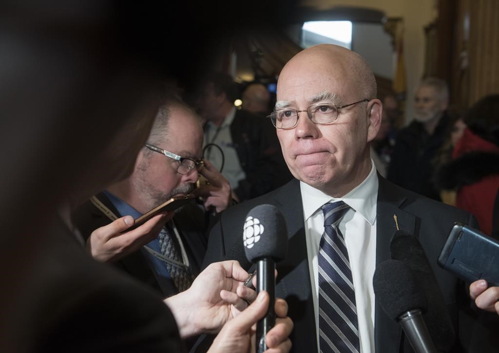 David Coon, MLA and leader of the New Brunswick Green Party, reacts to the budget delivered by New Brunswick Finance Minister Ernie Steeves in Fredericton, N.B., on Tuesday March 10, 2020. New Brunswick's minority Tory government should survive a confidence vote on the provincial budget next week now that Coon has decided to support it. THE CANADIAN PRESS/Stephen MacGillivray.