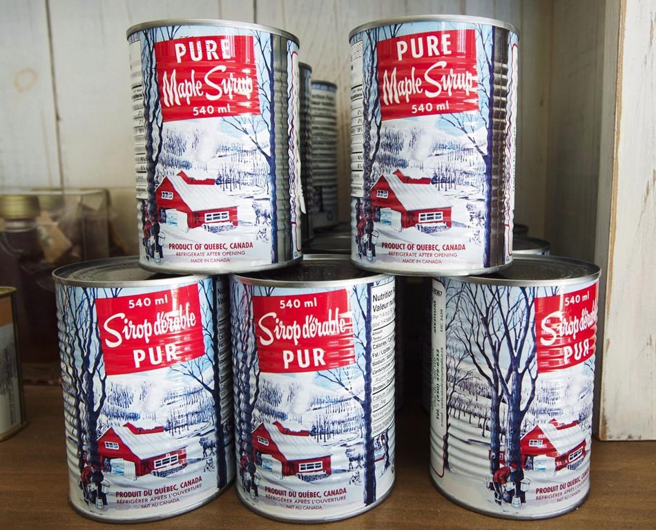 Maple syrup cans are seen at a sugar shack Friday, February 10, 2017 in Oka, Que. When it comes to maple syrup production in Canada, Quebec dominates, but a claim by Ontario of being second has left a sour taste in the mouth of some producers in New Brunswick. THE CANADIAN PRESS/Ryan Remiorz.