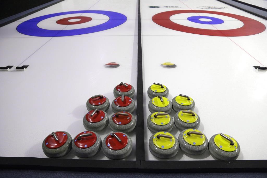 Curling rocks are shown Friday, Feb. 10, 2017, during a media demonstration the day before the opening ceremonies of the USA Curling Nationals in Everett, Wash. The women's world curling championship in Prince George, B.C., joined the expanding list of COVID-19 cancellations in the sports world Thursday. THE CANADIAN PRESS/AP, Ted S. Warren.
