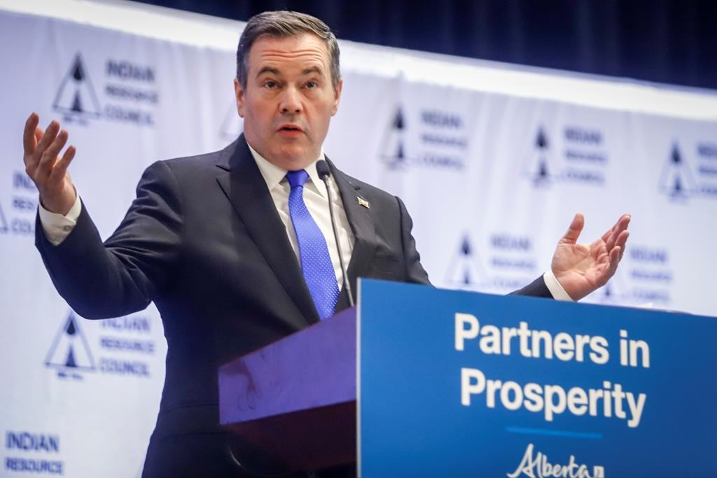 File: Alberta Premier Jason Kenney delivers remarks at a conference in Calgary on February 26, 2020.
