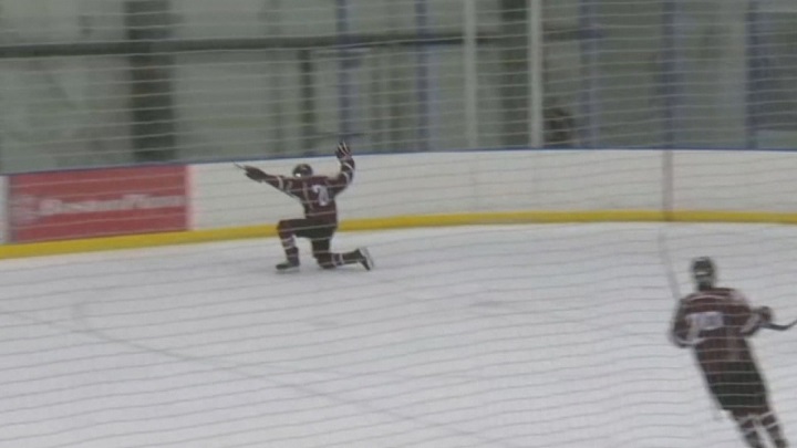St. Paul's Crusaders forward Cam McDonald celebrates his second period goal in game two of the Winnipeg High School Hockey League's championship series.