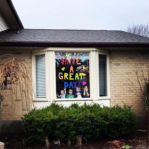 Corban, Deacon, Caleb and Reed Hoffmann pose in the window of their northwest London, Ont., home.