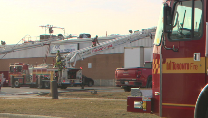 Crews at the scene of the fire near Kipling Avenue and Rexdale Boulevard on Monday.