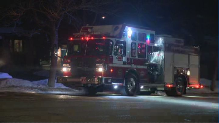 A woman was pulled from a house fire on Edgehill Drive N.W. in north Calgary on Sunday, March 8, 2020.